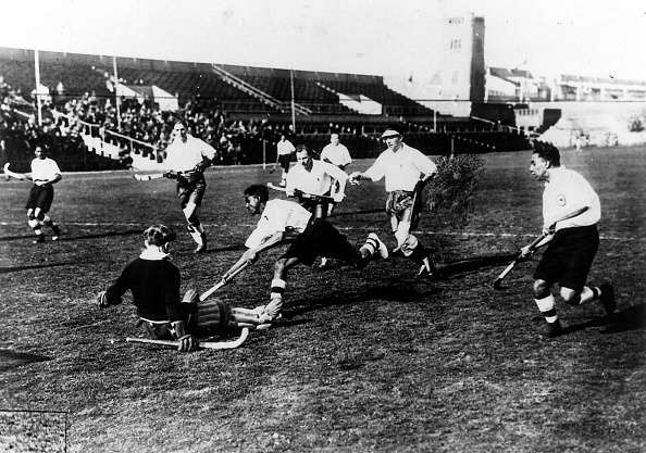 Dhyan Chand scoring a goal in the 1928 Olympics