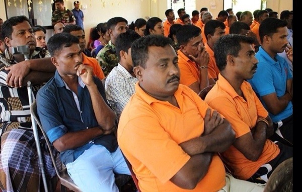 Former LTTE cadres at a reorientation lecture in a rehabilitation camp. 