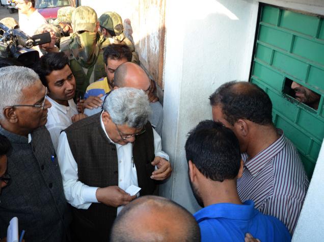 Geelani refuses to let in members of the all-party delegation from Delhi. Seen in the picture are Sitaram Yachuri of the Communist Party of India (Marxist) and D.Raja of the Communist Party of India