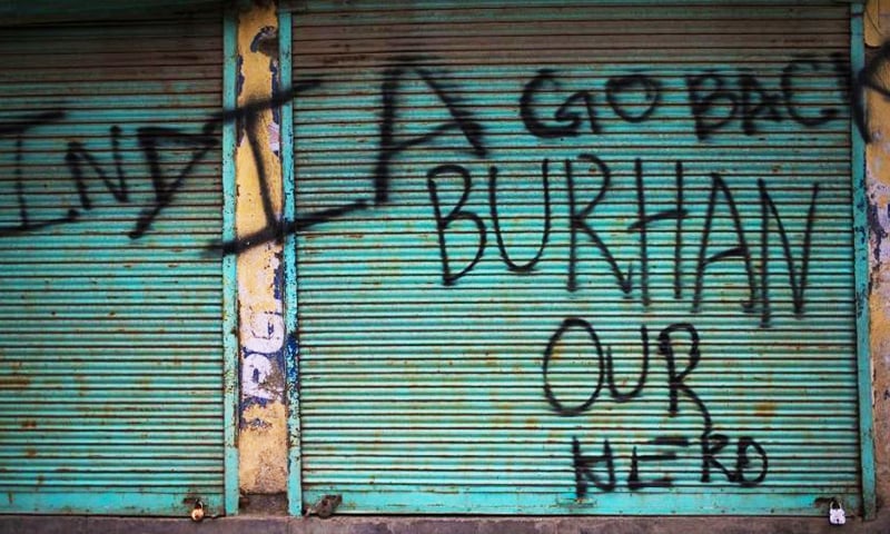 "India Go Back, Burhan Is Our Hero" says a slogan on the shutters of a shop in Kashmir.