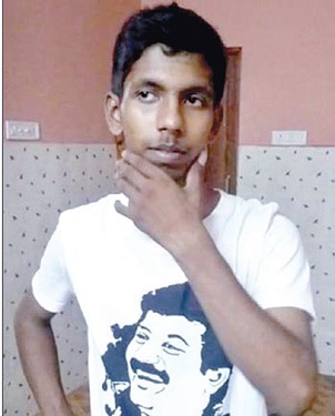 21 year old Vignesh, a follower of Naam Tamilar Katchi who committed self immolation on Friday was a devotee of LTTE leader Prabhakaran as seen in the T-shirt he is wearing