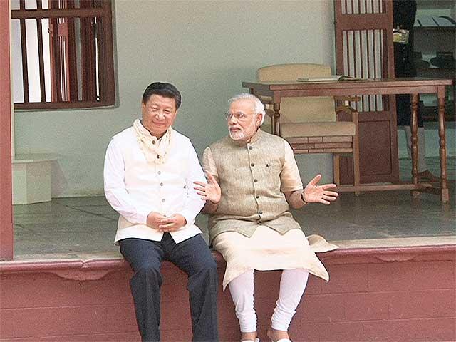 Chinese President Xi Jinping with India's Prime Minister Narendra Modi at Ahmadabad in friendlier times. 