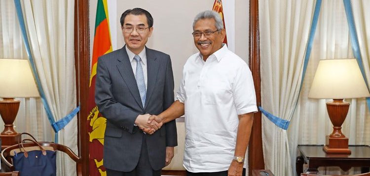 China says Lanka has agreed to develop Hambantota port “on the existing consensus”, thereby opting out of renegotiation