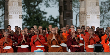 Buddhist monks arrive for the prayers of a pirith chanting throughout the night for the well being of coronavirus affected people in the world, in Colombo. (Photo:Reuters)