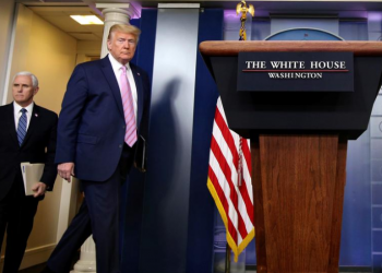 U.S. President Donald Trump and Vice President Mike Pence arrive to lead the coronavirus response daily briefing at the White House in Washington, U.S., April 10, 2020. REUTERS/Yuri Gripas
