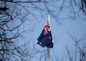 FILE PHOTO: An Australian flag is pictured at its embassy in Beijing, China January 24, 2019. REUTERS/Jason Lee