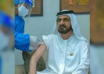 Sheikh Mohammed shared a picture on Twitter of him getting vaccinated by a medical staffer. (Photo: Twitter)