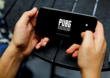 FILE PHOTO: A boy plays Tencent Holdings' PUBG videogame on his mobile phone. September 3, 2020. REUTERS/Adnan Abidi/File Photo