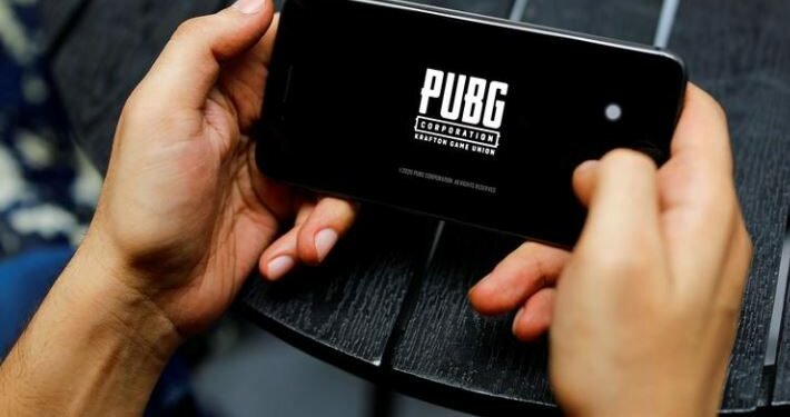 FILE PHOTO: A boy plays Tencent Holdings' PUBG videogame on his mobile phone. September 3, 2020. REUTERS/Adnan Abidi/File Photo
