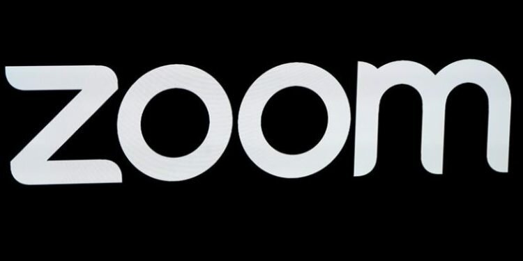 FILE PHOTO: The Zoom Video Communications logo is pictured at the NASDAQ MarketSite in New York, New York, U.S., April 18, 2019. REUTERS/Carlo Allegri/File Photo