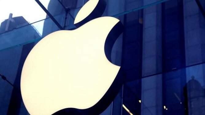 FILE PHOTO: The Apple Inc logo is seen hanging at the entrance to the Apple store on 5th Avenue in Manhattan, New York, U.S., October 16, 2019. REUTERS/Mike Segar