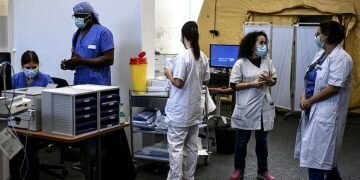 File photo of healthcare workers during the coronavirus pandemic in Paris. Image credits - Getty Images