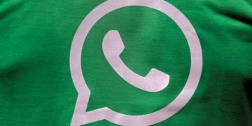 FILE PHOTO: A logo of WhatsApp is pictured on a T-shirt worn by a WhatsApp-Reliance Jio representative during a drive by the two companies to educate users, on the outskirts of Kolkata, India, October 9, 2018. Picture taken October 9, 2018. REUTERS/Rupak De Chowdhuri/File Photo