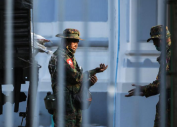 Myanmar soldiers are seen inside City Hall in Yangon, Myanmar February 1, 2021. REUTERS/Stringer