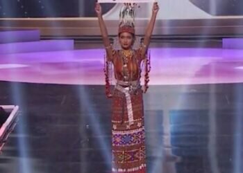 Ma Thuzar Wint Lwin, Miss Universe Myanmar, holds up the "Pray for Myanmar" sign during Miss Universe pageant's national costume show, in Hollywood, Florida, U.S., May 13, 2021 in this screengrab taken from a handout video. Courtesy MISS UNIVERSE/Handout via REUTERS