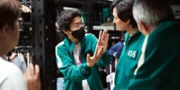 Squid Game creator Hwang Dong-hyuk with actor Lee Jung-jae on the sets. (Photo: Netflix)