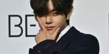 South Korean K-pop boy band BTS member V poses for a photo session during a press conference on BTS new album 'BE (Deluxe Edition)' in Seoul on November 20, 2020. Jung Yeon-je / AFP