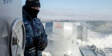 A Ukrainian navy sailor is seen on board an armoured gunboat during a short voyage near a base of the Ukrainian Naval Forces in the Azov Sea port of Berdyansk, Ukraine January 12, 2022. REUTERS/Anastasia Vlasova