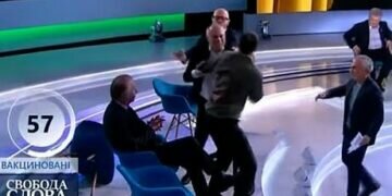 Ukrainian Journalist punches politician on live TV