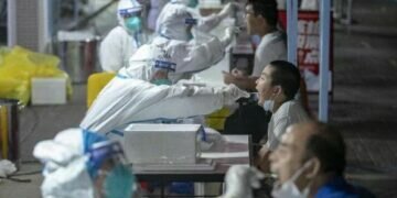 China calls COVID 'lab leak' theory a lie after WHO report (Image: AFP)