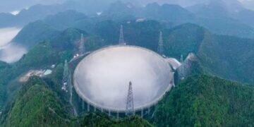 Aerial photo taken on March 31, 2021 shows China's Five-hundred-meter Aperture Spherical Radio Telescope FAST under maintenance in southwest China's Guizhou Province. Ou Donggu/Getty Images