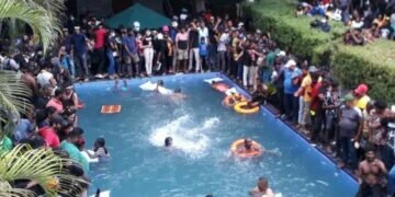 After storming the presidential palace in Colombo, some protestors swam in the pool at the official residence