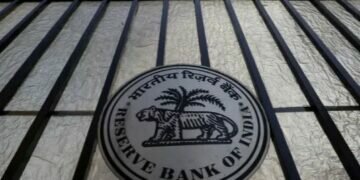 The Reserve Bank of India seal is pictured on a gate outside the RBI headquarters in Mumbai