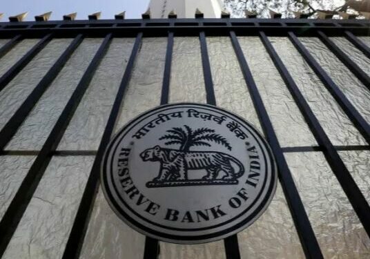 The Reserve Bank of India seal is pictured on a gate outside the RBI headquarters in Mumbai