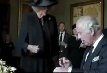 Screengrab of video with King Charles III showing displeasure over a leaking pen