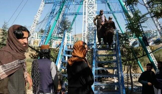 Taliban fighters - seen here in September 2021 - were spotted visiting a park soon after arriving in the capital. Image credits - Getty Images