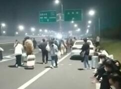 Workers flee China’s biggest iPhone factory over Covid outbreak