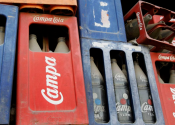 Crates of old bottles at a dilapidated Campa Cola factory in New Delhi, India, on Monday, Feb. 9, 2009. The former headquarters has been shuttered for years but the brand may be about to make a comeback.