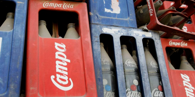 Crates of old bottles at a dilapidated Campa Cola factory in New Delhi, India, on Monday, Feb. 9, 2009. The former headquarters has been shuttered for years but the brand may be about to make a comeback.