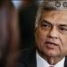Lanka’s main opposition party split on the issue of working with President Wickremesinghe