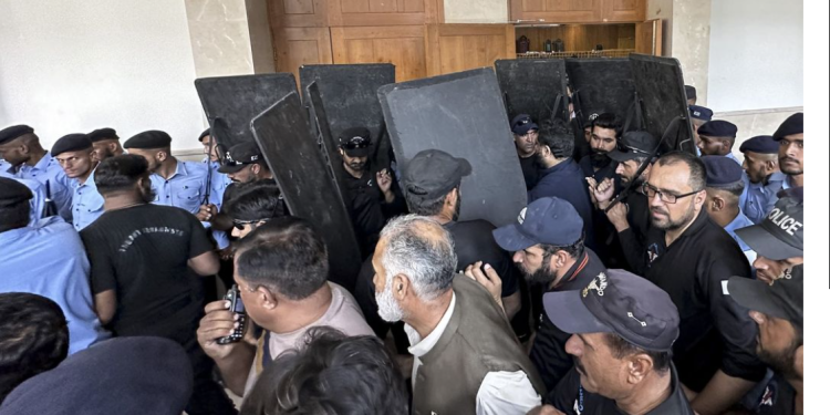 Pakistan’s military tightens grip with broad clampdown on opposition, media